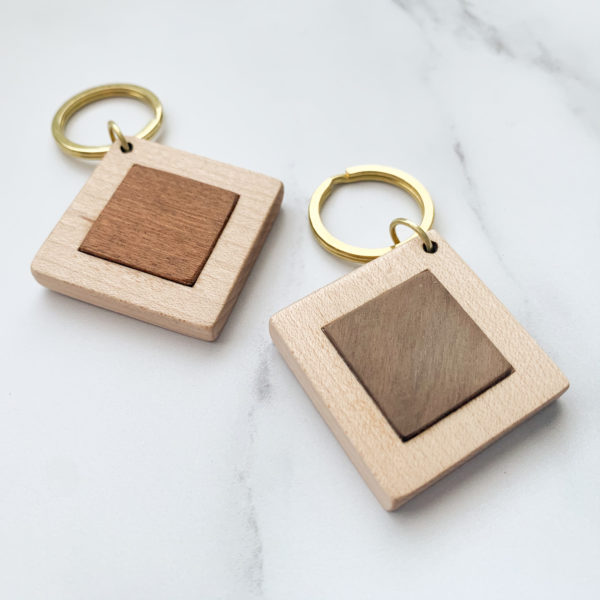 Vannucchi Jewellery's pale white wood, square key ring with mahogany or walnut inlay