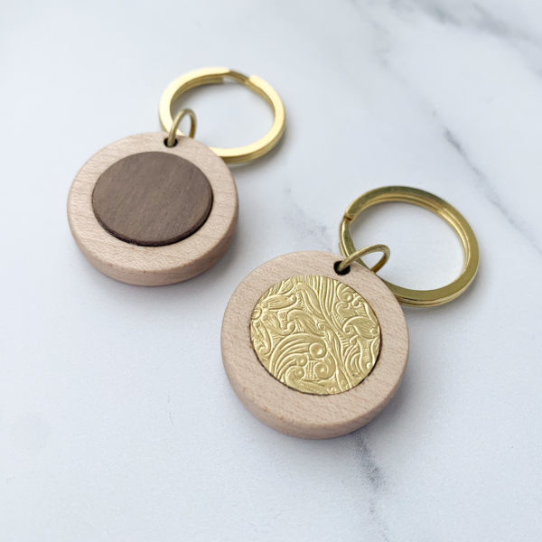 Vannucchi Jewellery's pale white wood, round key ring with brass or walnut inlay