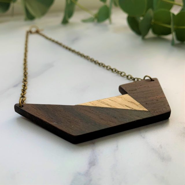 Angled shot of Rose wood geometric necklace created by Vannucchi Jewellery