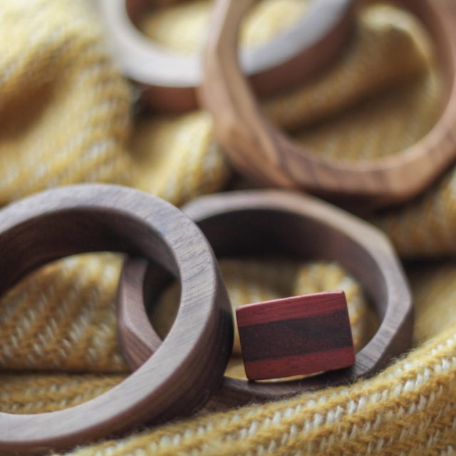 Selection of Vannucchi wooden bangles and a red wooden ring