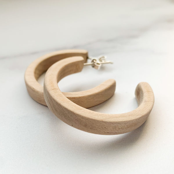 Vannucchi Jewellery, Sarah maple wood, hooped earrings lie overlapping