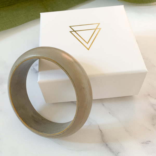 Vannucchi Jewellery Pamela wood bangle in grey, displayed with branded box