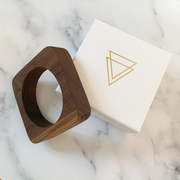 Vannucchi Jewellery's Cassandra Square Walnut bangle displayed with branded box