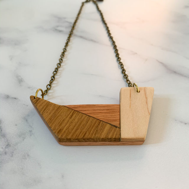 Front facing angle of Vannucchi Jewellery Grandis wood geometric necklace