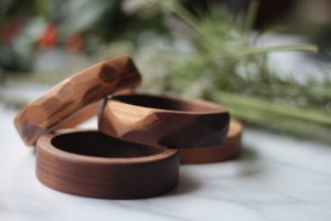 Selection of piled Vannucchi walnut wood bangles