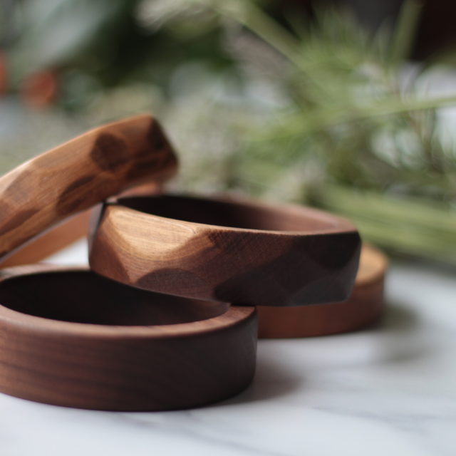 Selection of piled Vannucchi walnut wood bangles