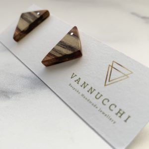 Nana triangle parana pine studs displayed on Vannucchi Jewellery packaging