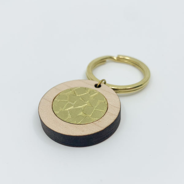 textured wood and brass key ring