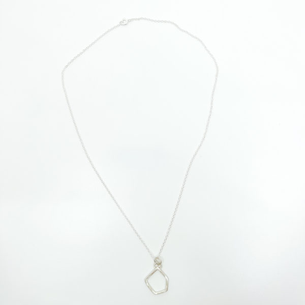 Collezione XXI Large Stone Necklace is displayed on white background. Can see full length of fine silver chain with silver square wire pendant.