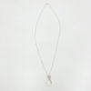 Collezione XXI Stone Necklace is displayed on a white background. Can see full length of necklace. Fine silver chain, with a small square wire irregular geometric shaped pendant.