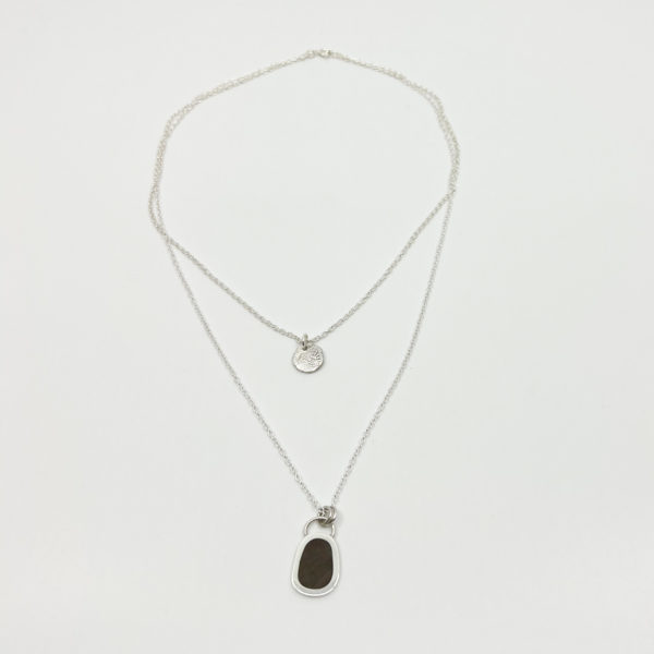 Collezione XXI, fine sterling silver, multi layered necklace on white background.