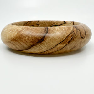 smooth round spalted beech bangle on white background