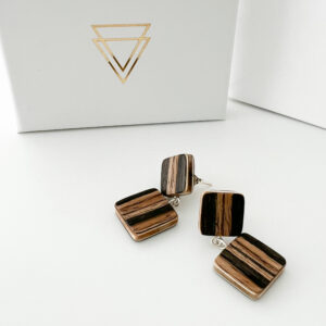Collezione XXIII Banda Earrings on white background with branded box.